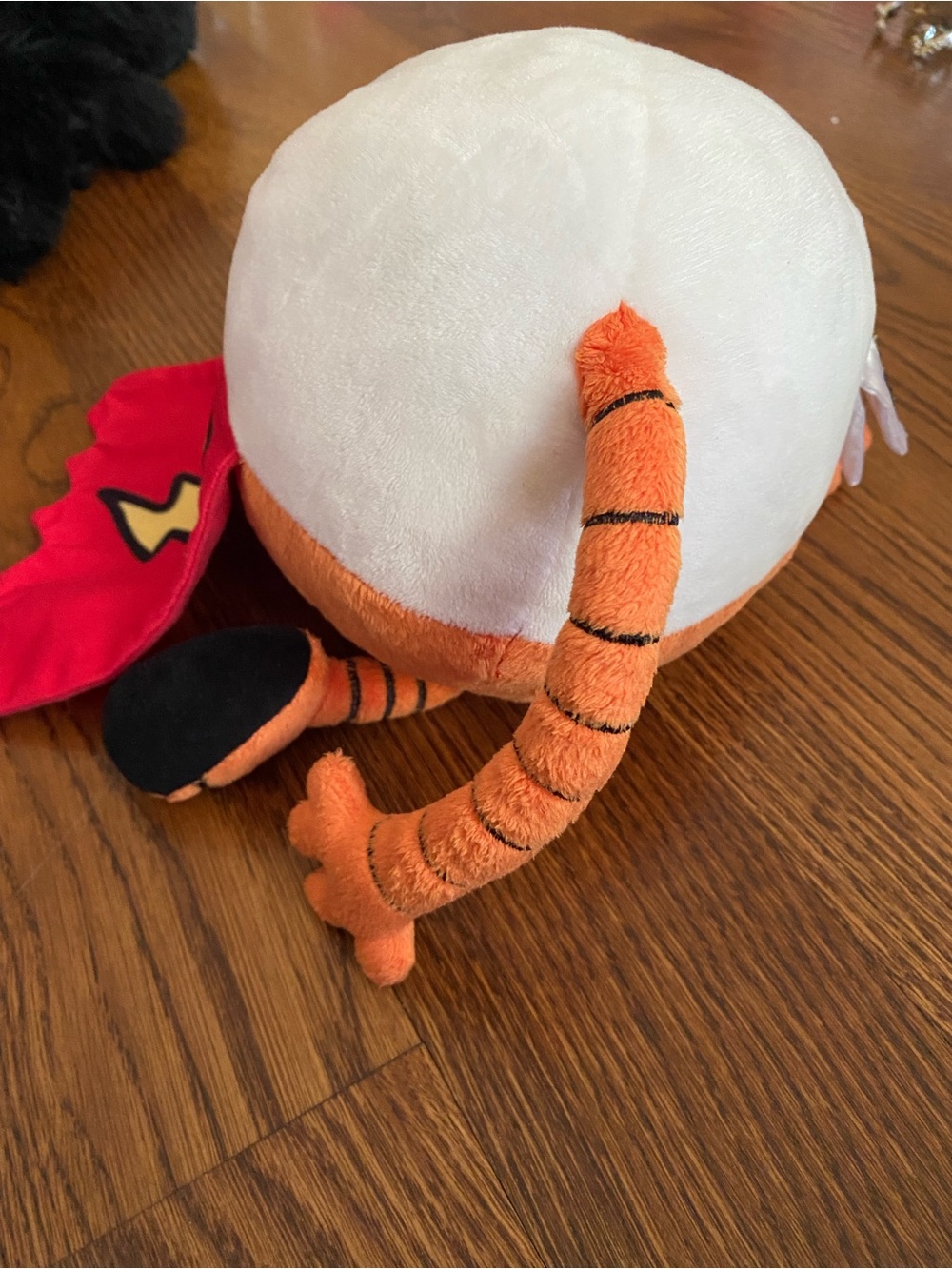 DOG MAN!!
Orange & White Plush Character with Striped Tail